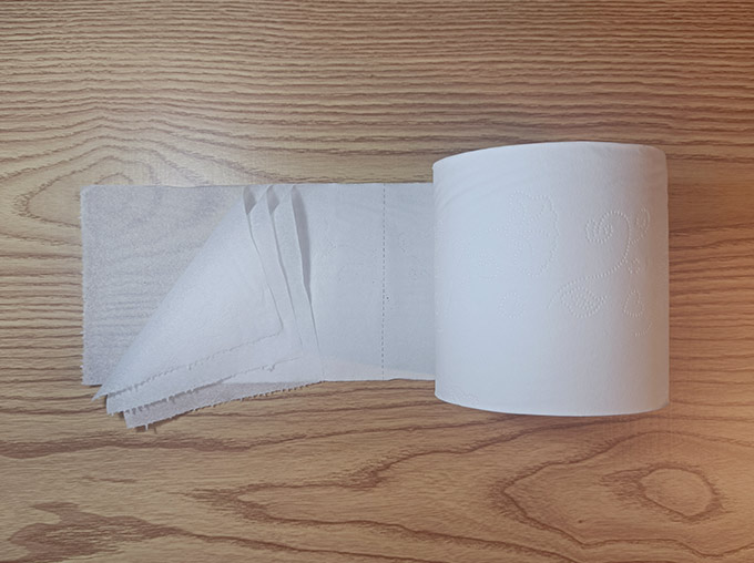 front view of 4 ply toilet paper in a tray