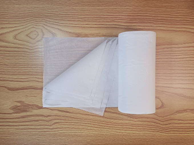 front view of toilet paper in a table