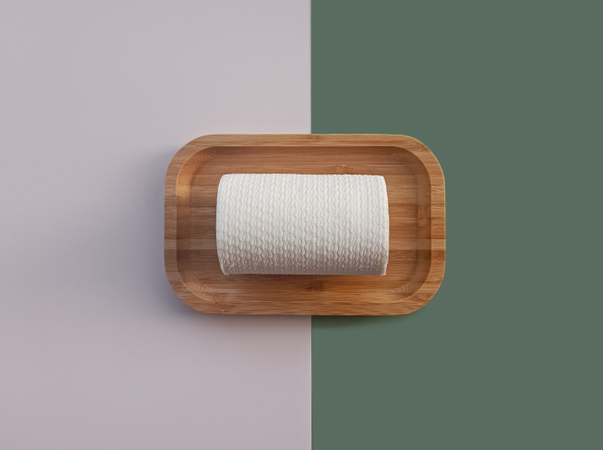 front view of toilet paper in a tray