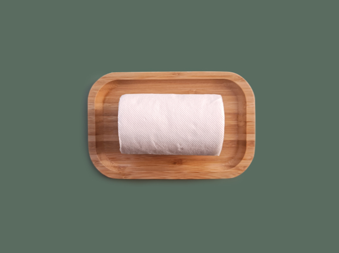 front view of toilet paper in a tray